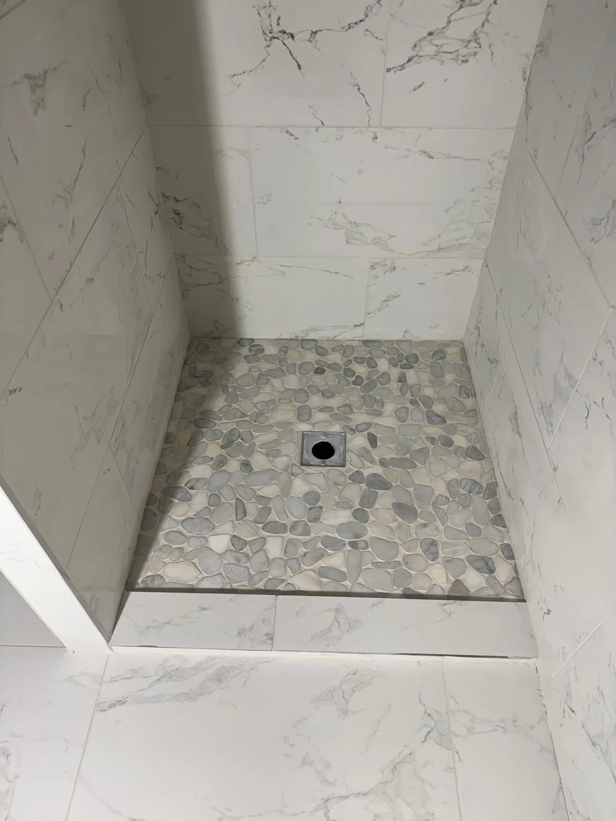 Pebble stone shower floor